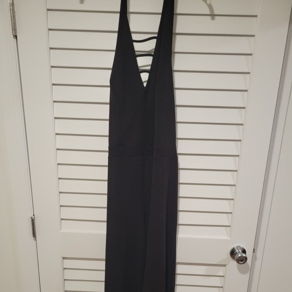 Black Sleeveless Strappy V‑Neck Jumpsuit